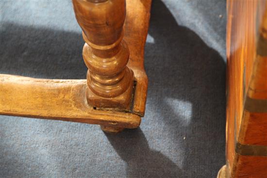 An early 18th century Spanish walnut draw leaf table, 10ft 5in. x 1ft 10in. x 2ft 6in.